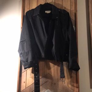 Distressed jean jacket.